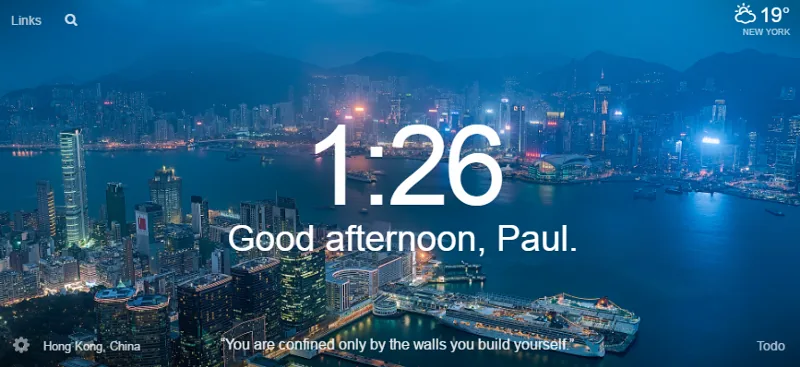 Momentum new tab page: a night view of Hong Kong's harbor, the time, “Good afternoon, Paul.” and the quote “You are confined only by the walls you build yourself.”